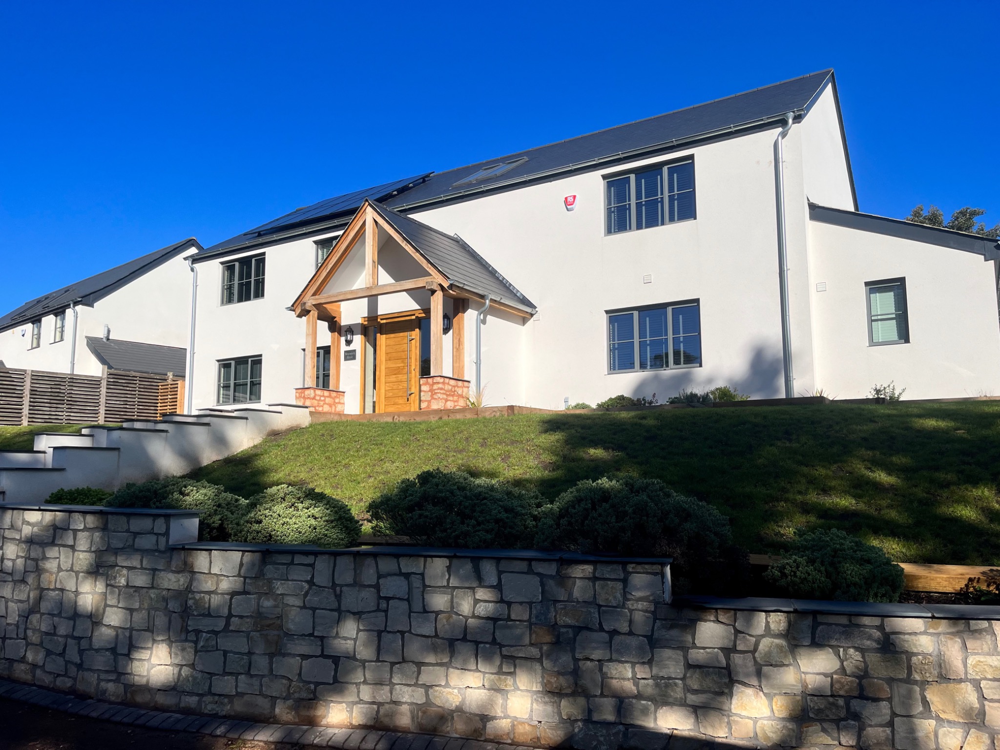 Modern home with a clean light render finish